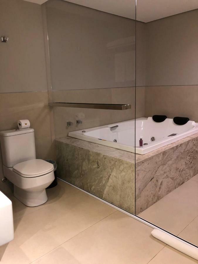 Dubai Suites Montes Claros Bagian luar foto